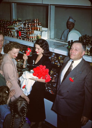 Stanley Genetti with Miss America at store opening